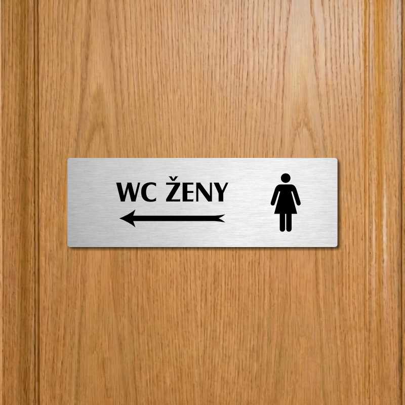 WC ženy vlevo, 200x66mm, zlatá popiska s ozdobou uprostřed